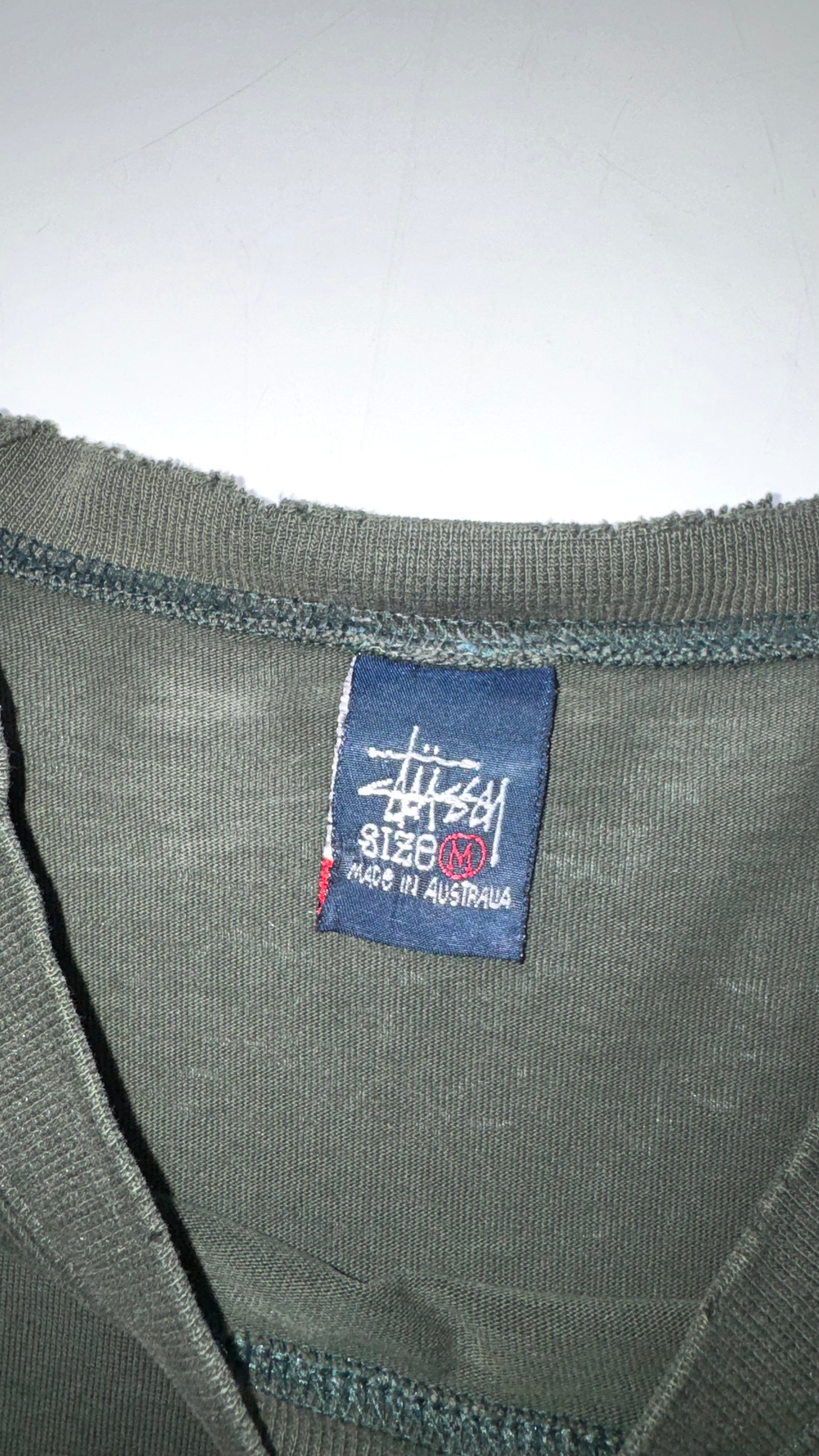 Vintage 90s Faded/Thrashed Dark Green Stussy T shirt