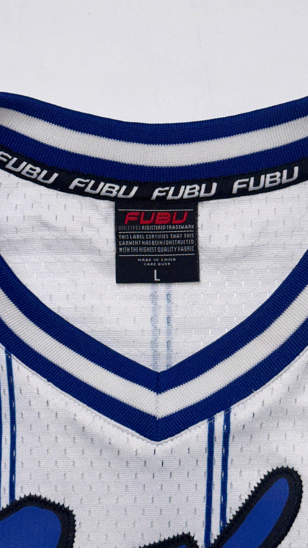 2000s FUBU White/Blue Stripped Jersey (L)