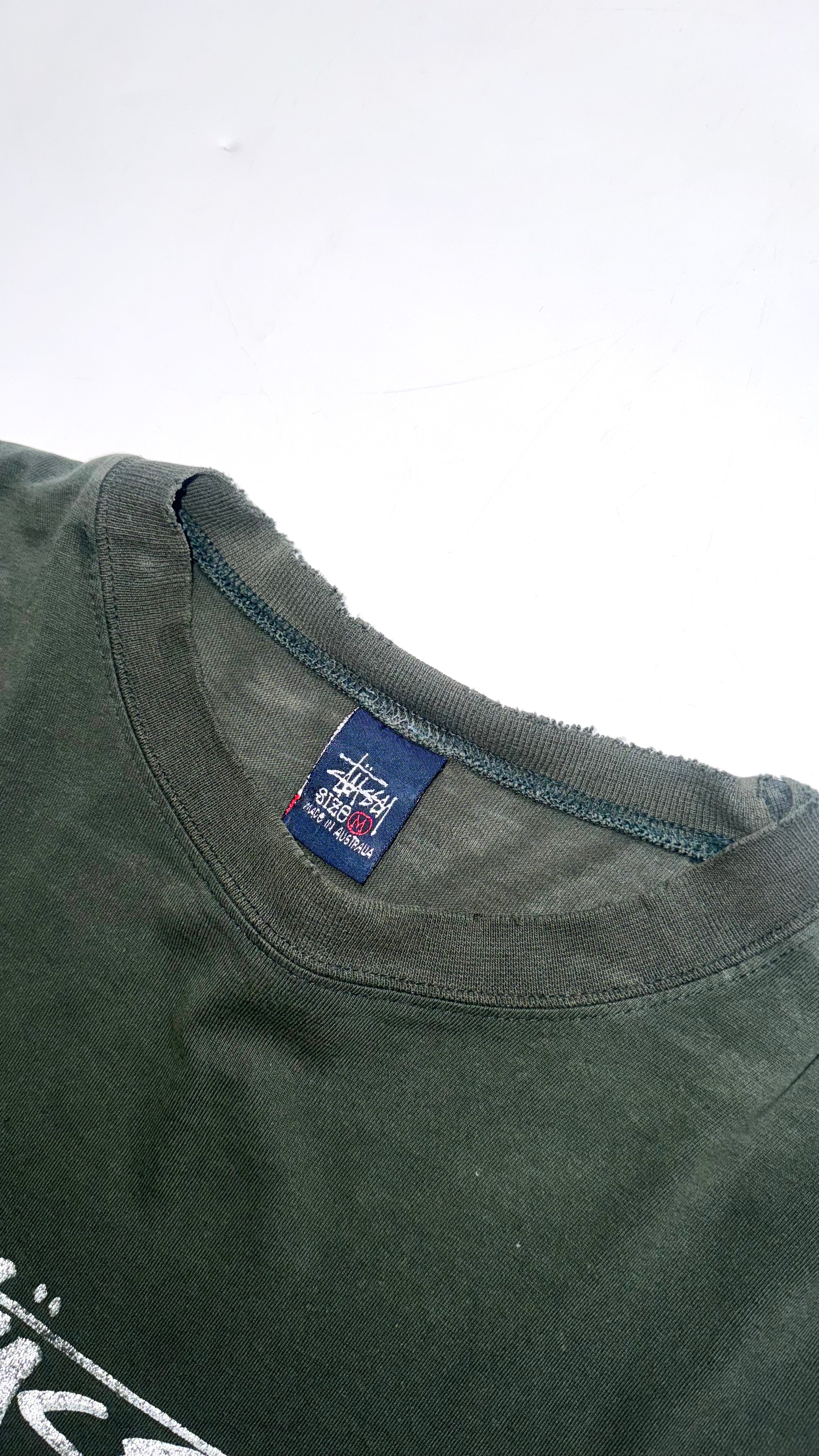 Vintage 90s Faded/Thrashed Dark Green Stussy T shirt